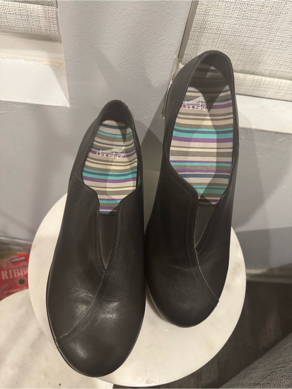 Dansko Black Leather Slip-On Clogs with Striped Lining